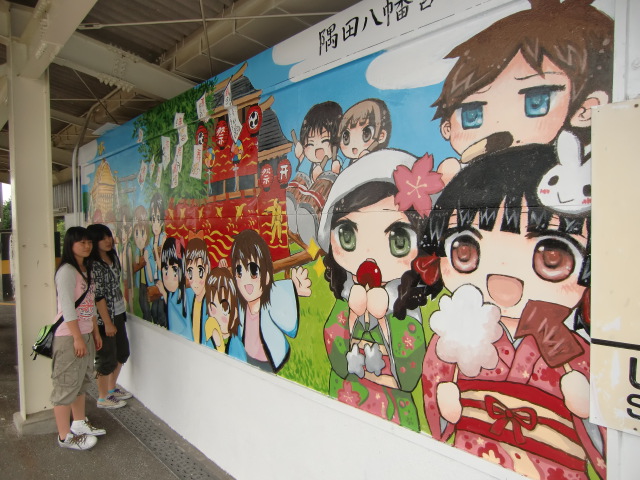 隅田駅プラットホーム壁面に描かれた「隅田八幡宮例大祭」の絵